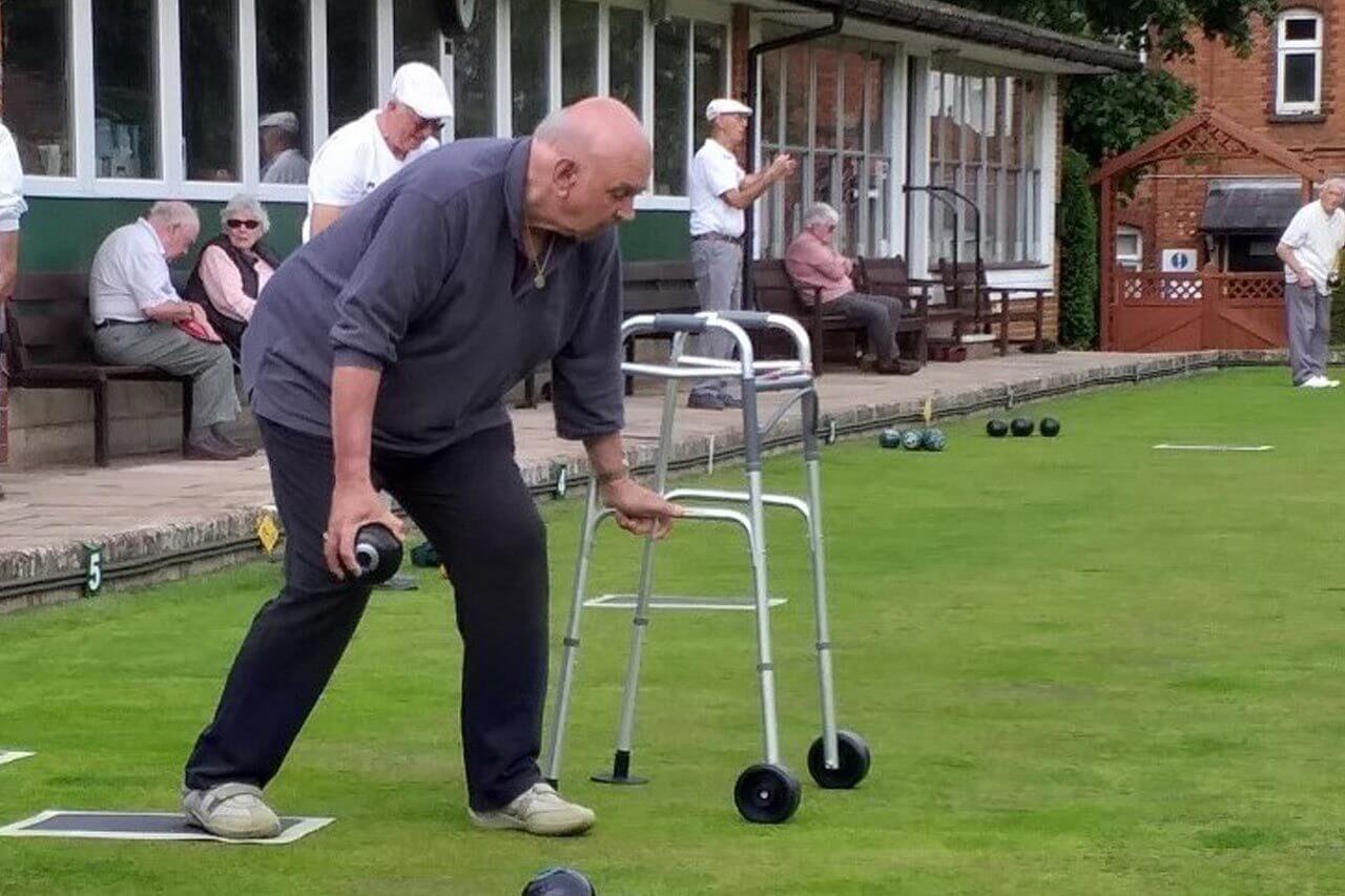 Man playing outdoor bowls