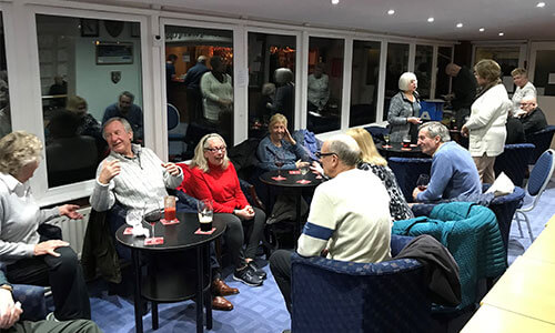 Dorking Bowls Members discussing the match